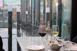 outdoor table setting with red and white wine