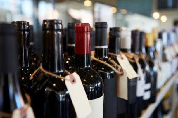 bottles of wines displayed in a shop