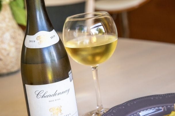 chardonnay wine bottle and glass